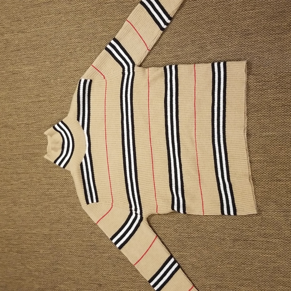 Medium, only worn one time sweater